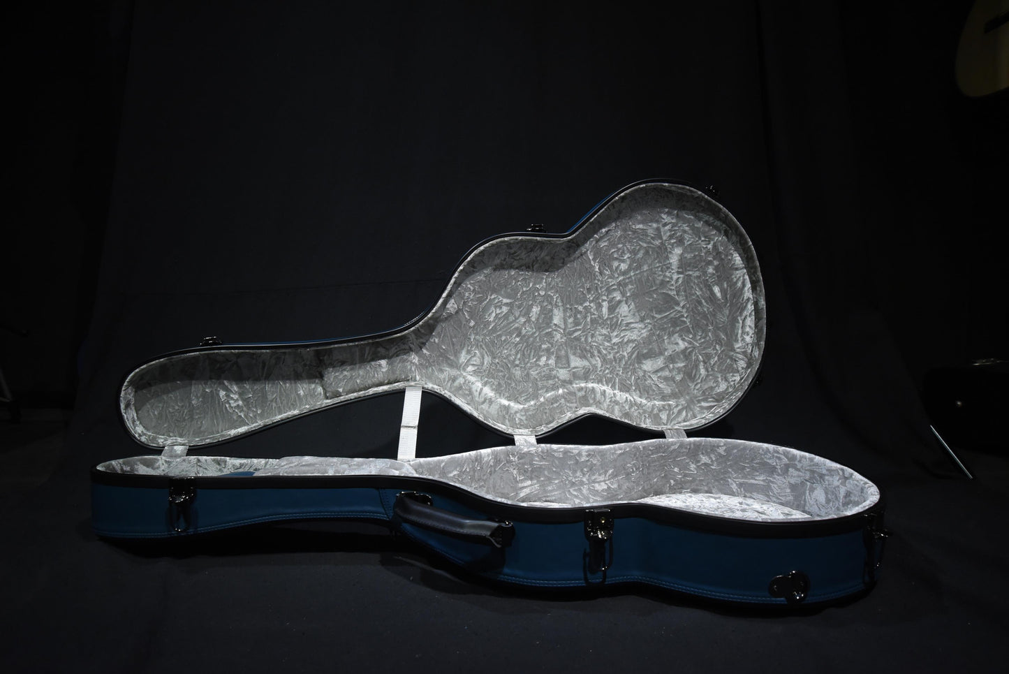 Hozen Guitars Polycarbonate Case Fully Bounded in Blue Leather