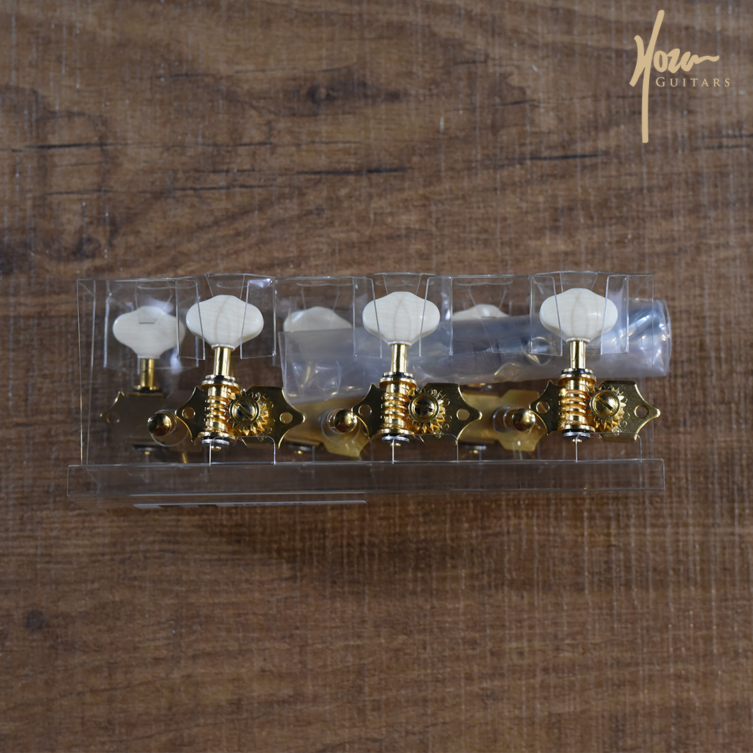 Gotoh Gold Slotted Headstock Tuners with White Knobs