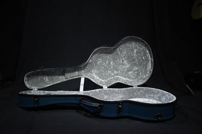 Hozen Guitars Polycarbonate Case Fully Bounded in Blue Leather